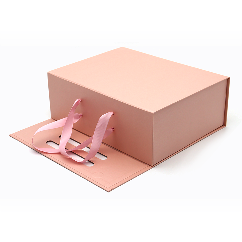 Aangepaste logo gedrukt vouwen papier platte pak cosmetische gift verpakking roze magnetische dozen met handvat